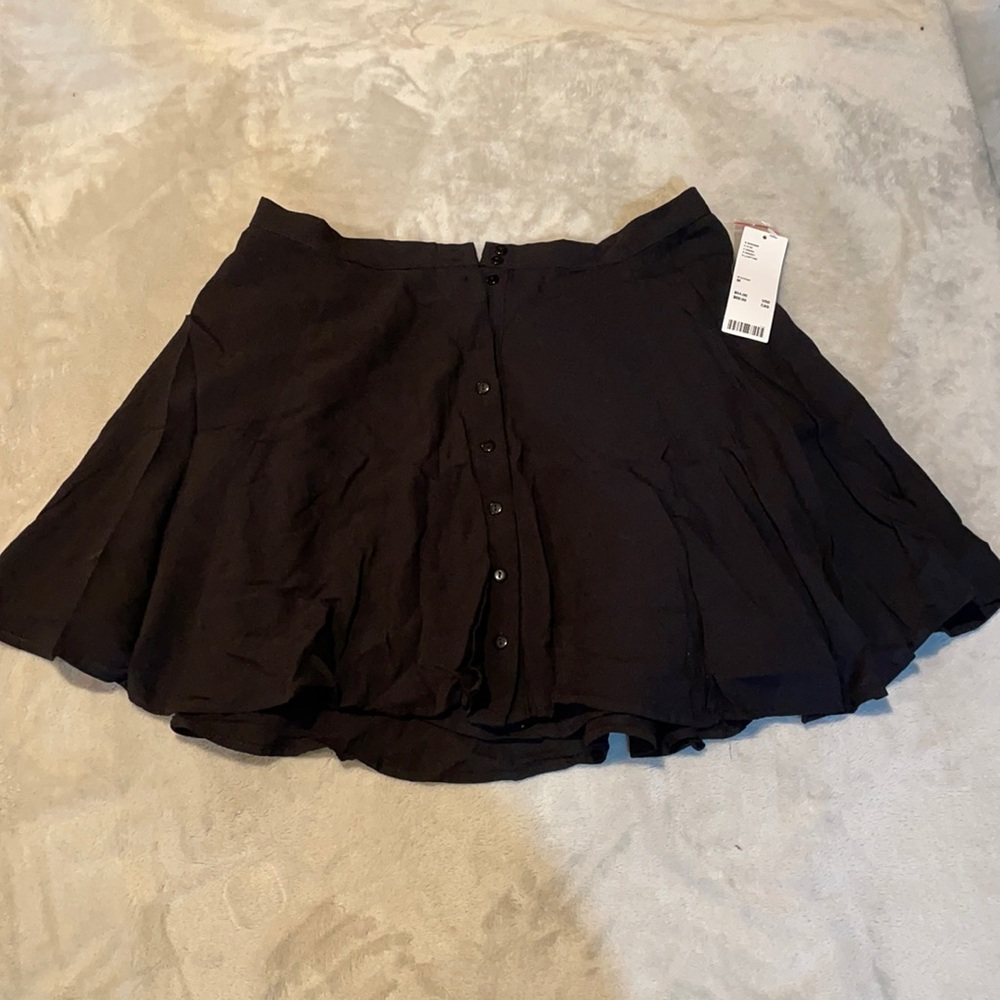 Black frill skirt with front button detail